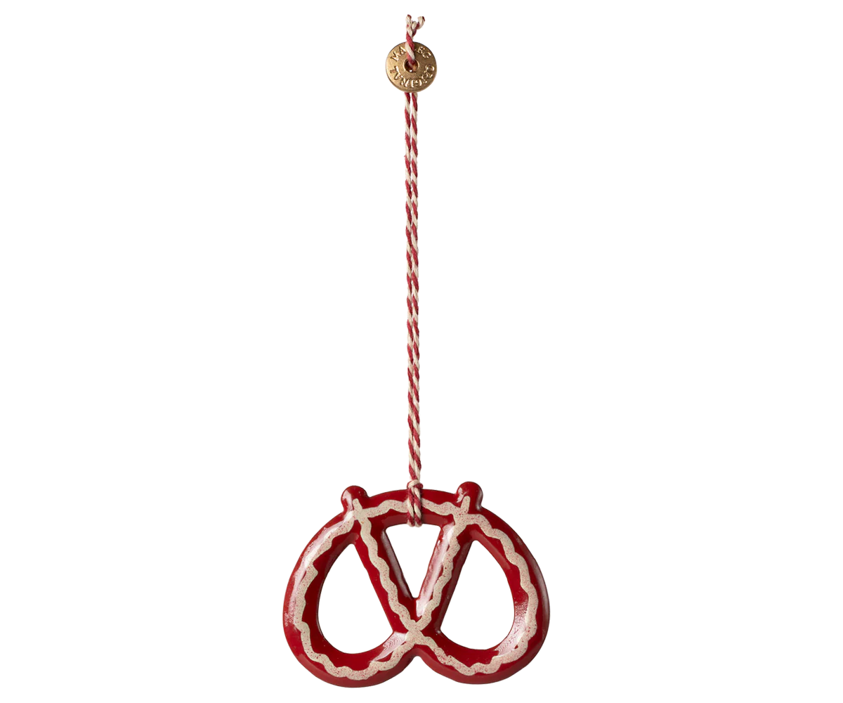 Metalophæng, Kringle - Strib