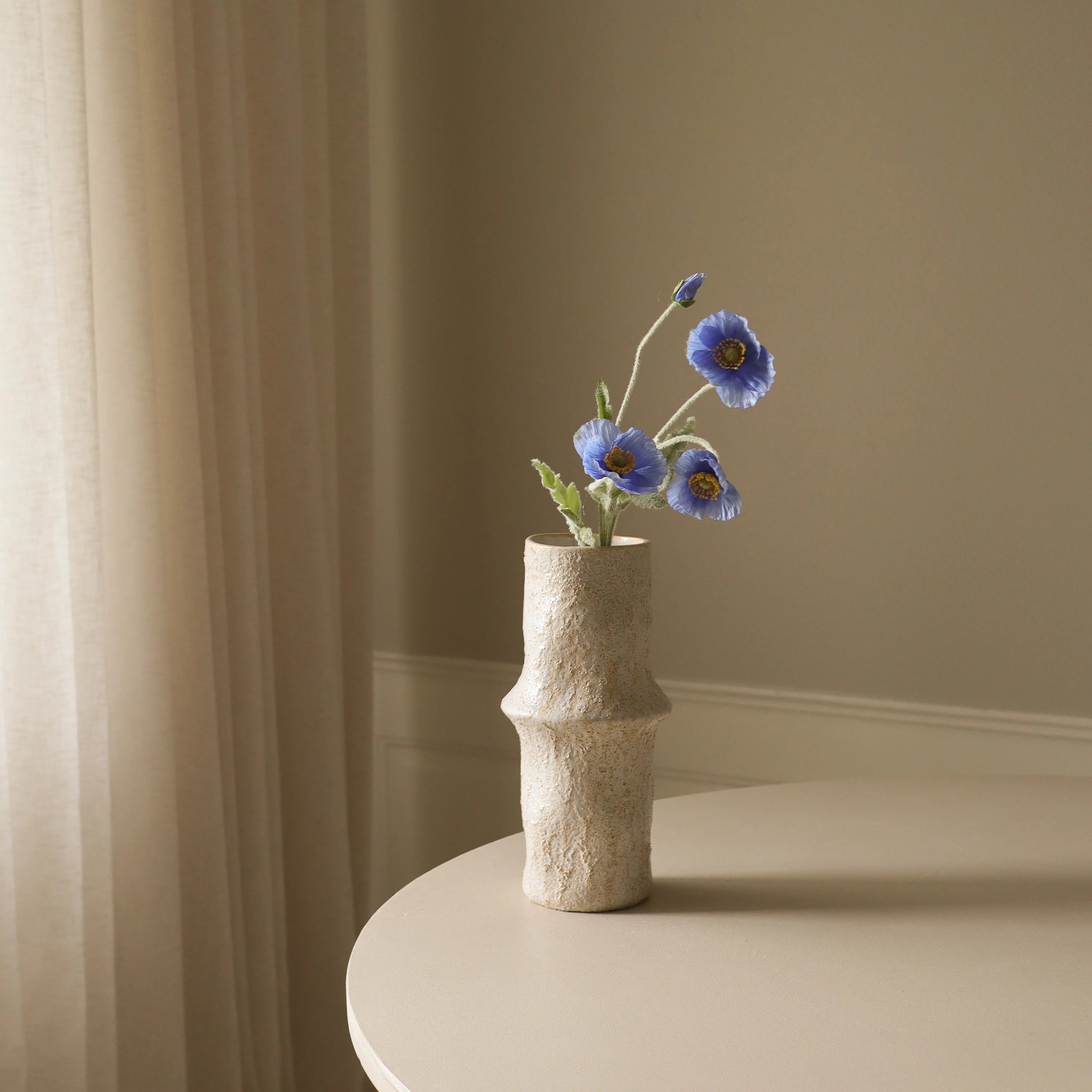 Blå valmueblomst