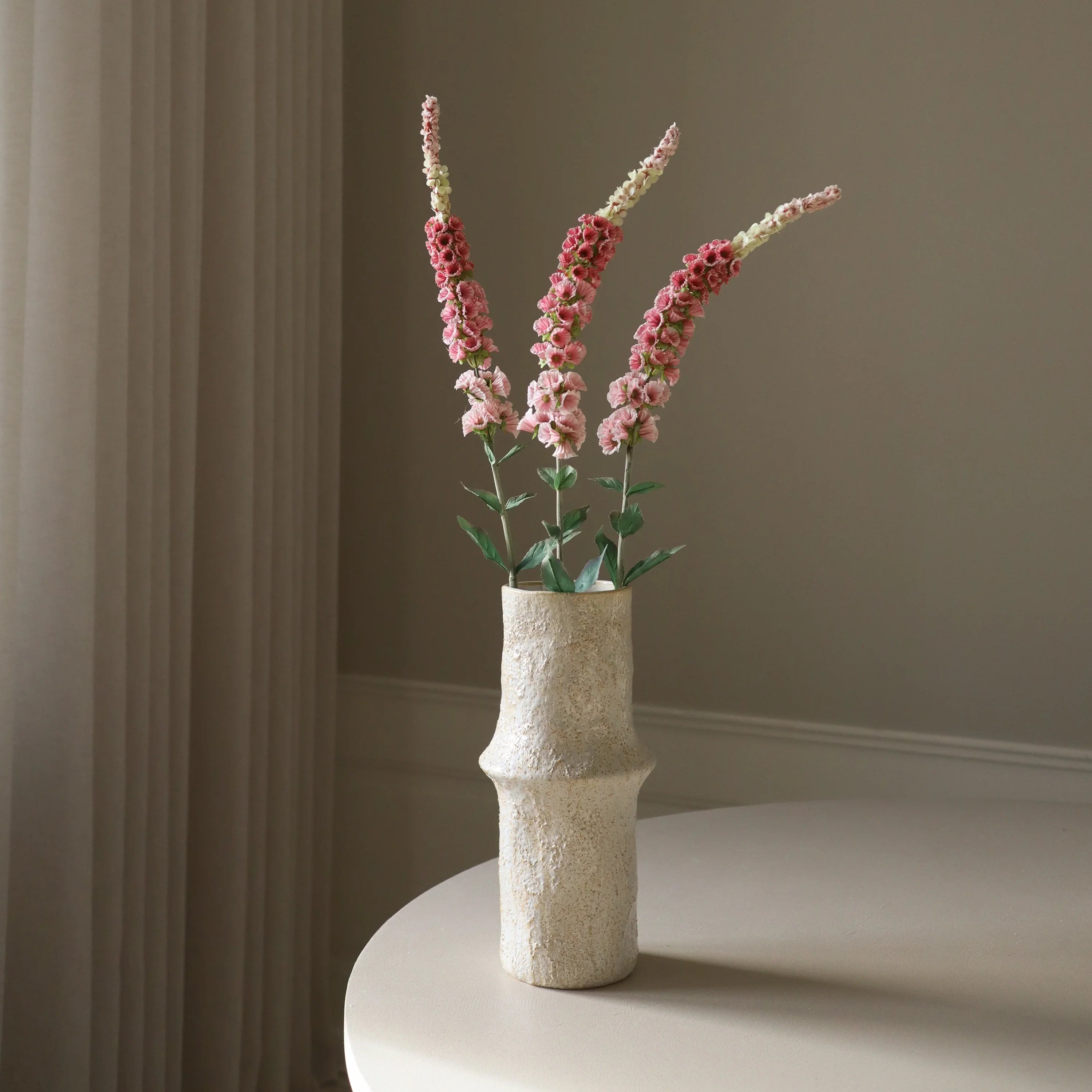 Lyserød rævehaleblomst