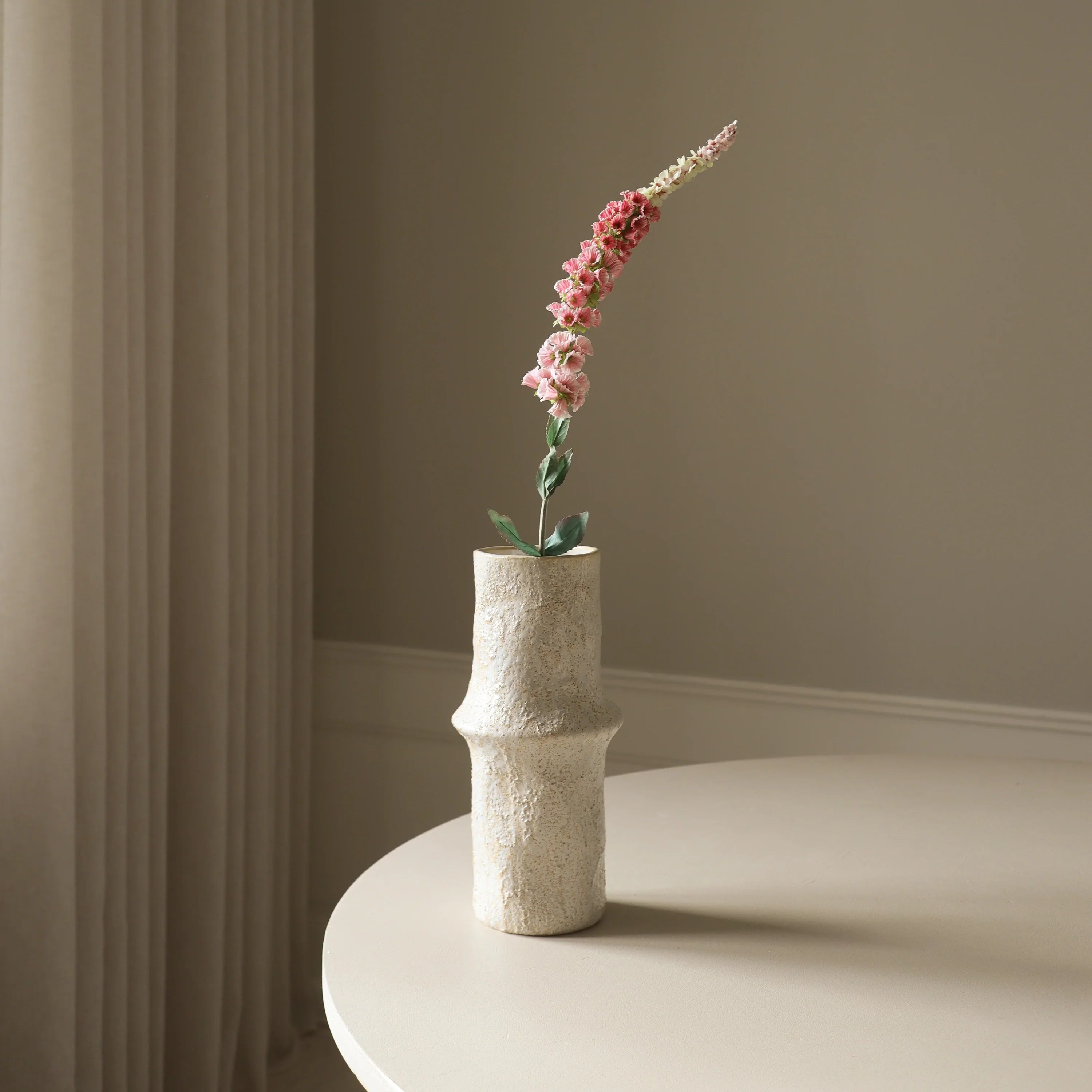 Lyserød rævehaleblomst